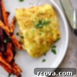 Crispy Air Fryer Frozen Cod 8 A delicious plate of Air Fryer Cod and crispy sweet potato fries, ready for serving.
