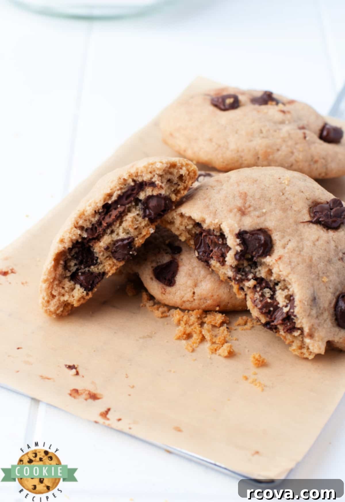 Gooey Nutella Stuffed Chocolate Chip Cookies 3 Homemade Chocolate Chip Cookies with a visible, delicious Nutella filling in the middle
