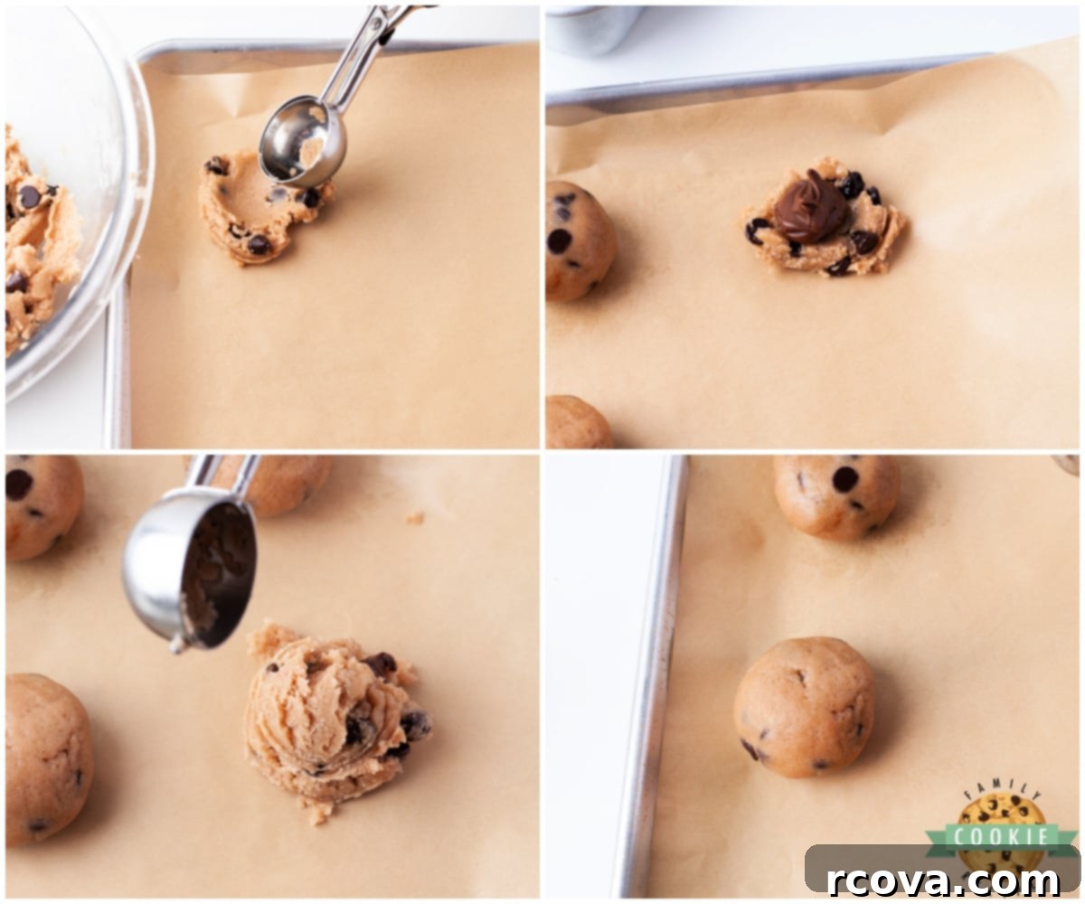 Gooey Nutella Stuffed Chocolate Chip Cookies 7 Detailed image of assembling Nutella Stuffed Chocolate Chip Cookies on a baking sheet