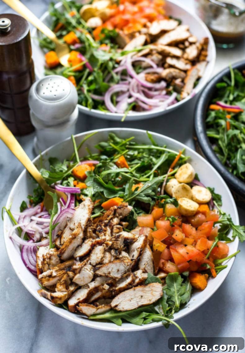 Chargrilled Chicken and Peppery Arugula Salad 2 Balsamic Grilled Chicken and Arugula Salad, featuring tender chicken, peppery arugula, and roasted sweet potatoes