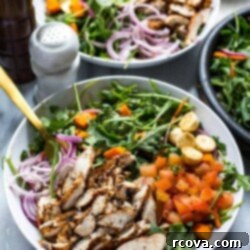 Chargrilled Chicken and Peppery Arugula Salad 8 Grilled Chicken Arugula Salad ready to be enjoyed, highlighting the fresh, vibrant ingredients.
