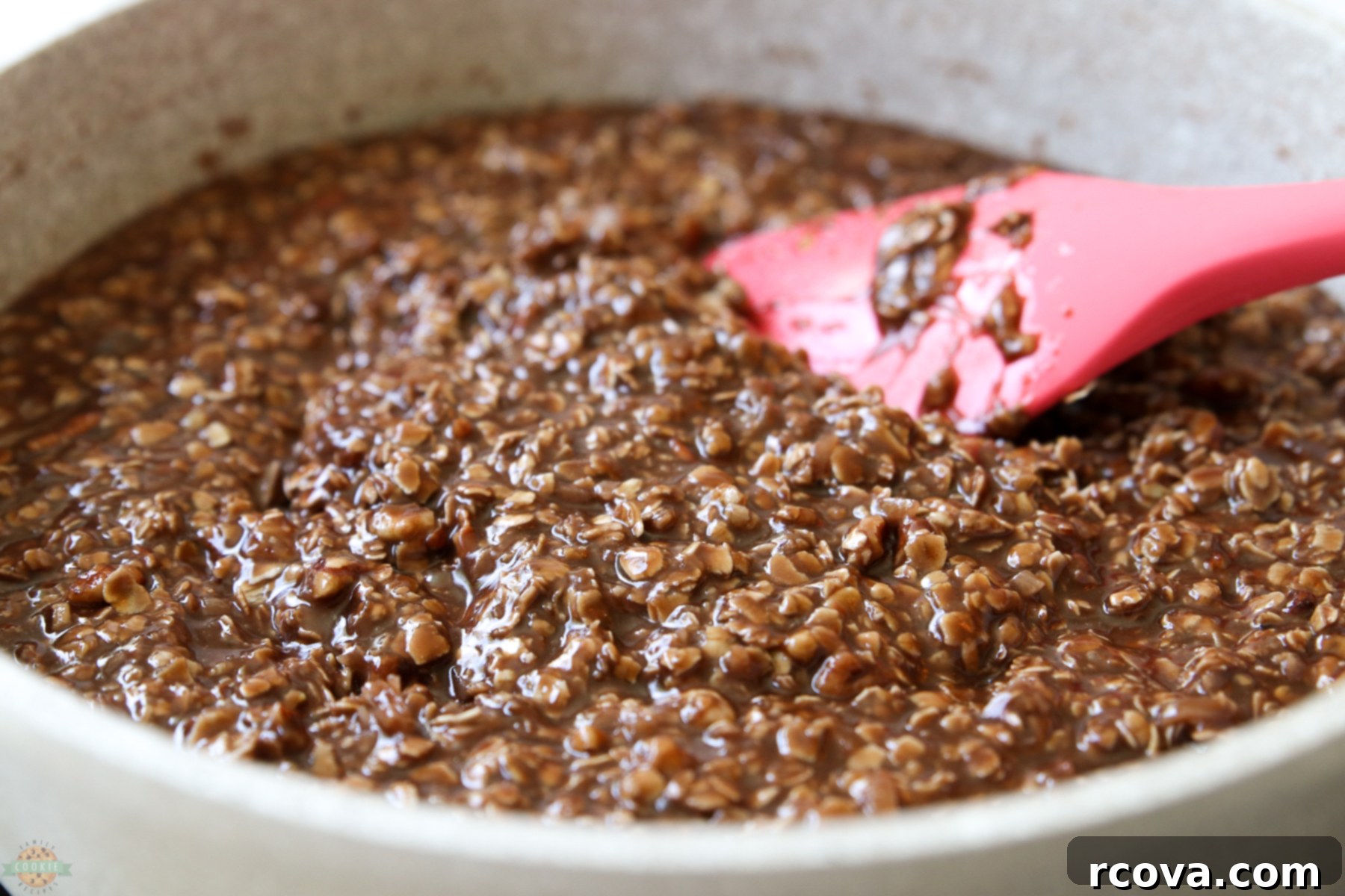 Effortless Peanut-Free No-Bake Cookie Perfection 4 stirring no bake cookie mixture in a saucepan on the stove