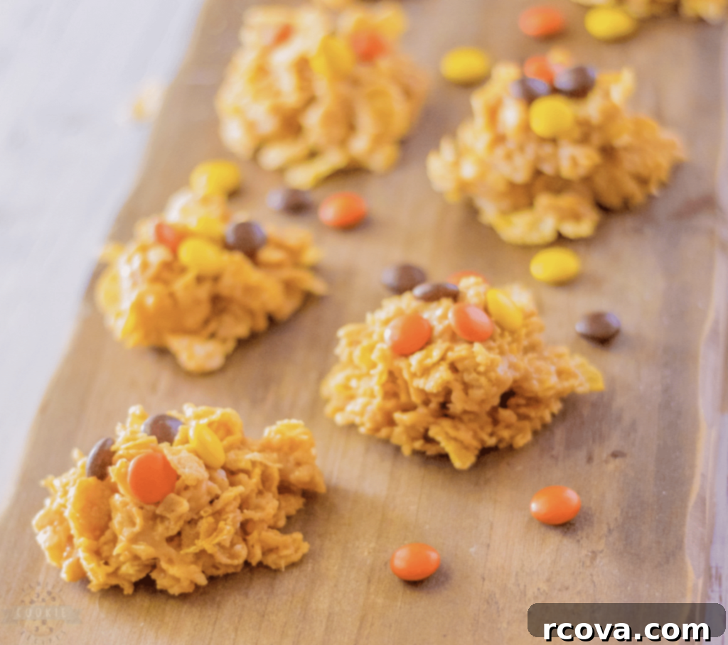 Peanut Butter Cookie Bliss 16 Easy 5-ingredient No-Bake Reese’s Peanut Butter Cornflake Cookies with Reese’s Pieces.