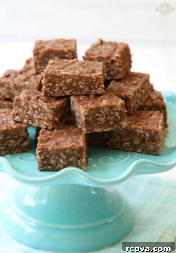 Decadent No-Bake Sweet Squares 4 Hands preparing no-bake cookie mixture on a baking sheet, spreading it evenly