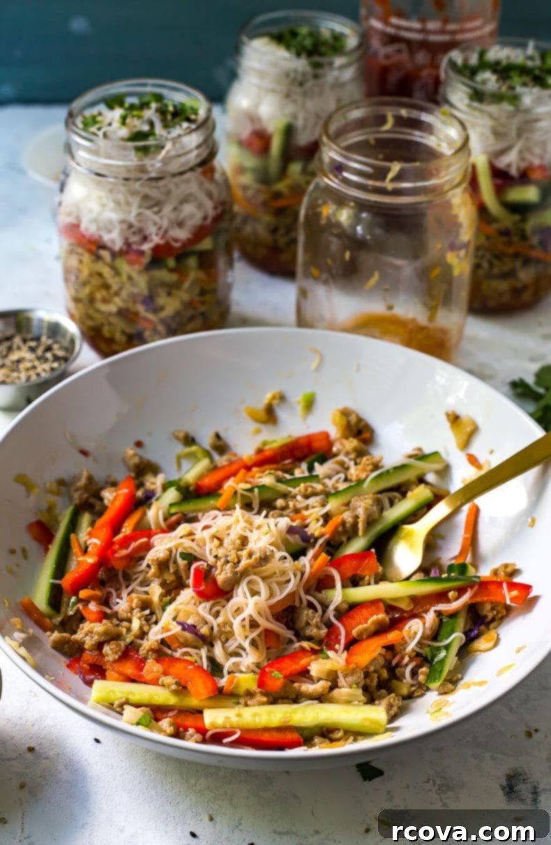 Effortless Chicken Spring Roll Jars 8 A beautifully arranged Quick & Easy Chicken Spring Roll Jar with all layers visible.
