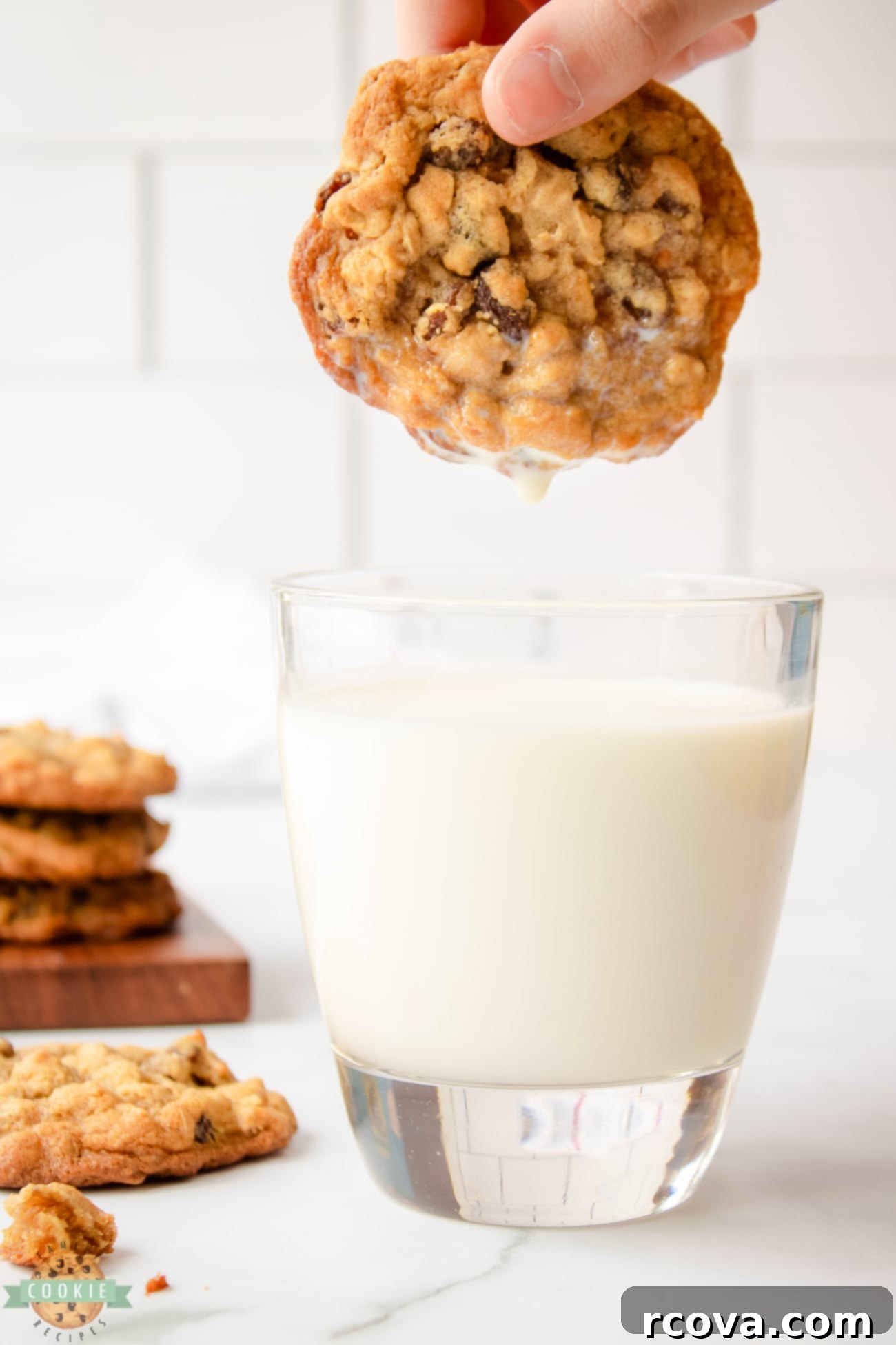 Soft and Chewy Oatmeal Raisin Cookies 5 dunking oatmeal raisin cookie in milk