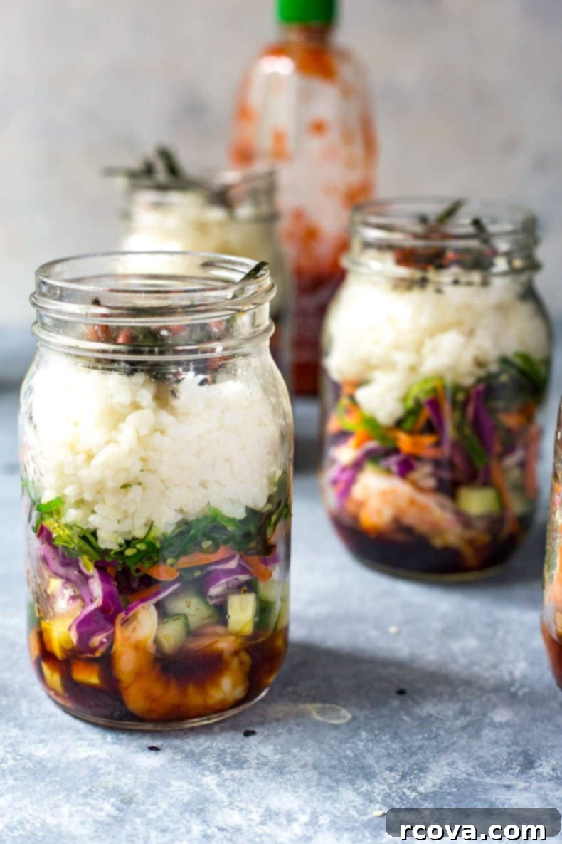 Meal Prep Dynamite Shrimp Sushi Jars 7 Beautifully plated Dynamite Shrimp Sushi Jars with chopsticks