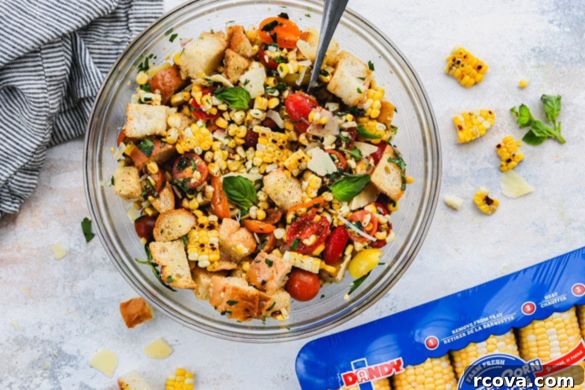 Smoky Corn and Tomato Panzanella 7 A large mixing bowl with Charred Corn and Tomato Panzanella Salad, ready to be served.