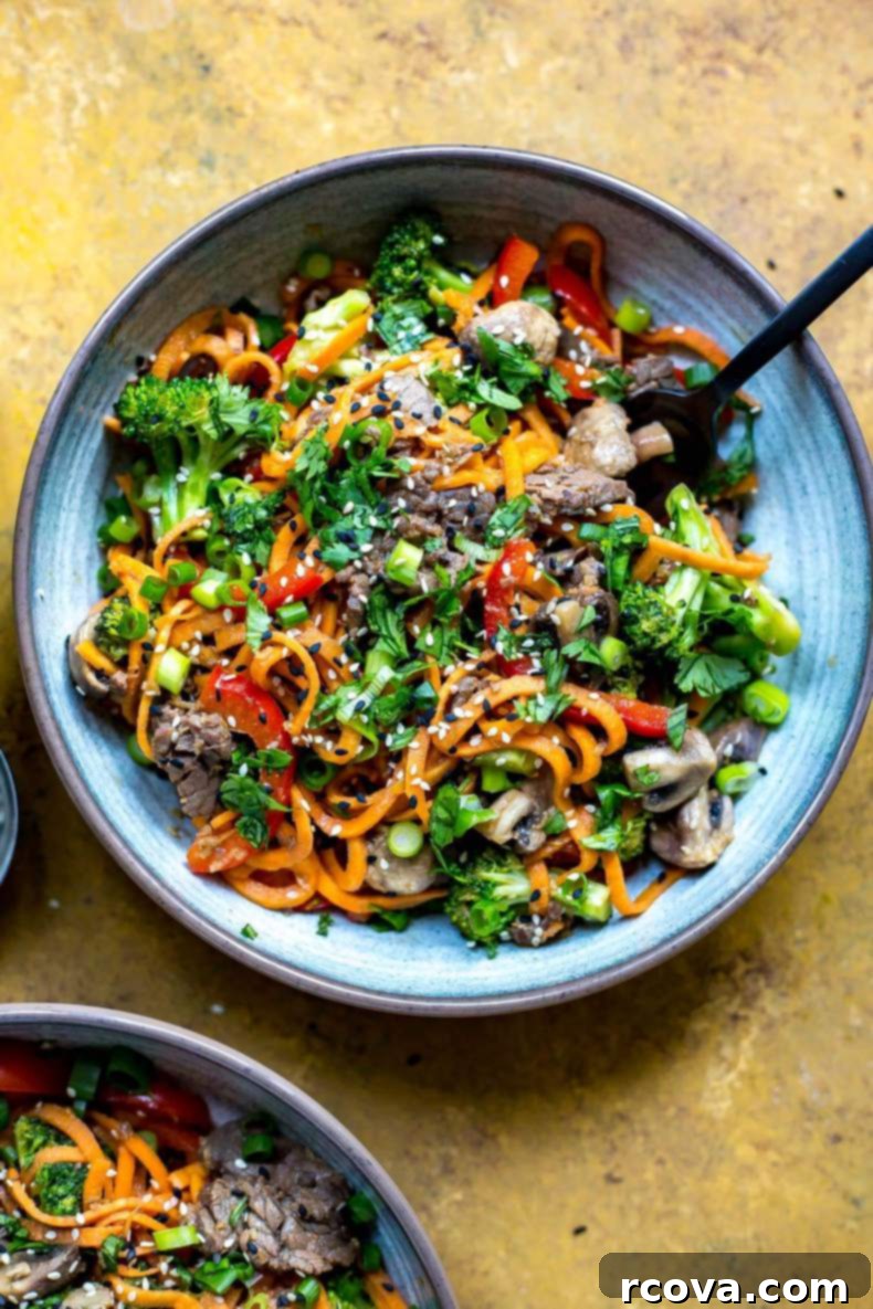 Quick Ginger Beef and Sweet Potato Noodles 8 A delicious bowl of ginger beef sweet potato noodles garnished with fresh scallions.