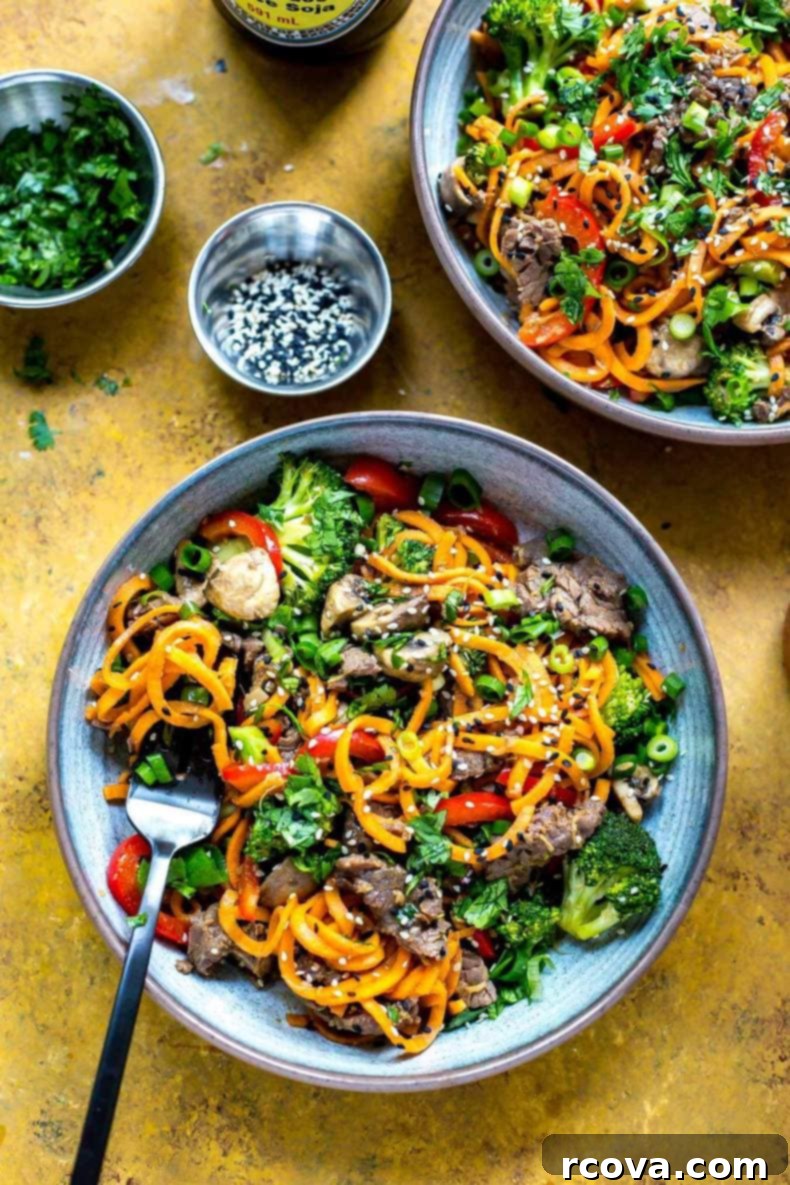 Quick Ginger Beef and Sweet Potato Noodles 10 A close-up shot of the savory ginger beef, perfectly tender and coated in sauce.