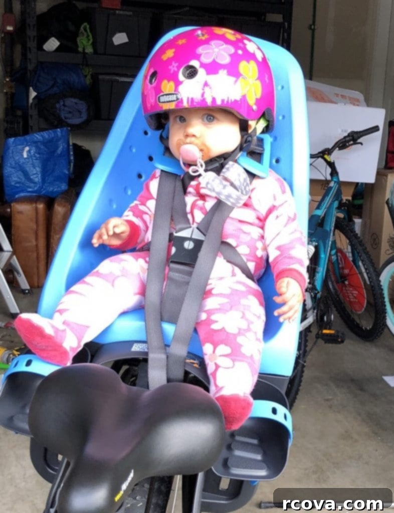 Fudgy Avocado Chocolate Chip Cookies 13 A cute little girl happily riding her bike for the first time, wearing a helmet and a big smile, enjoying a family outing.