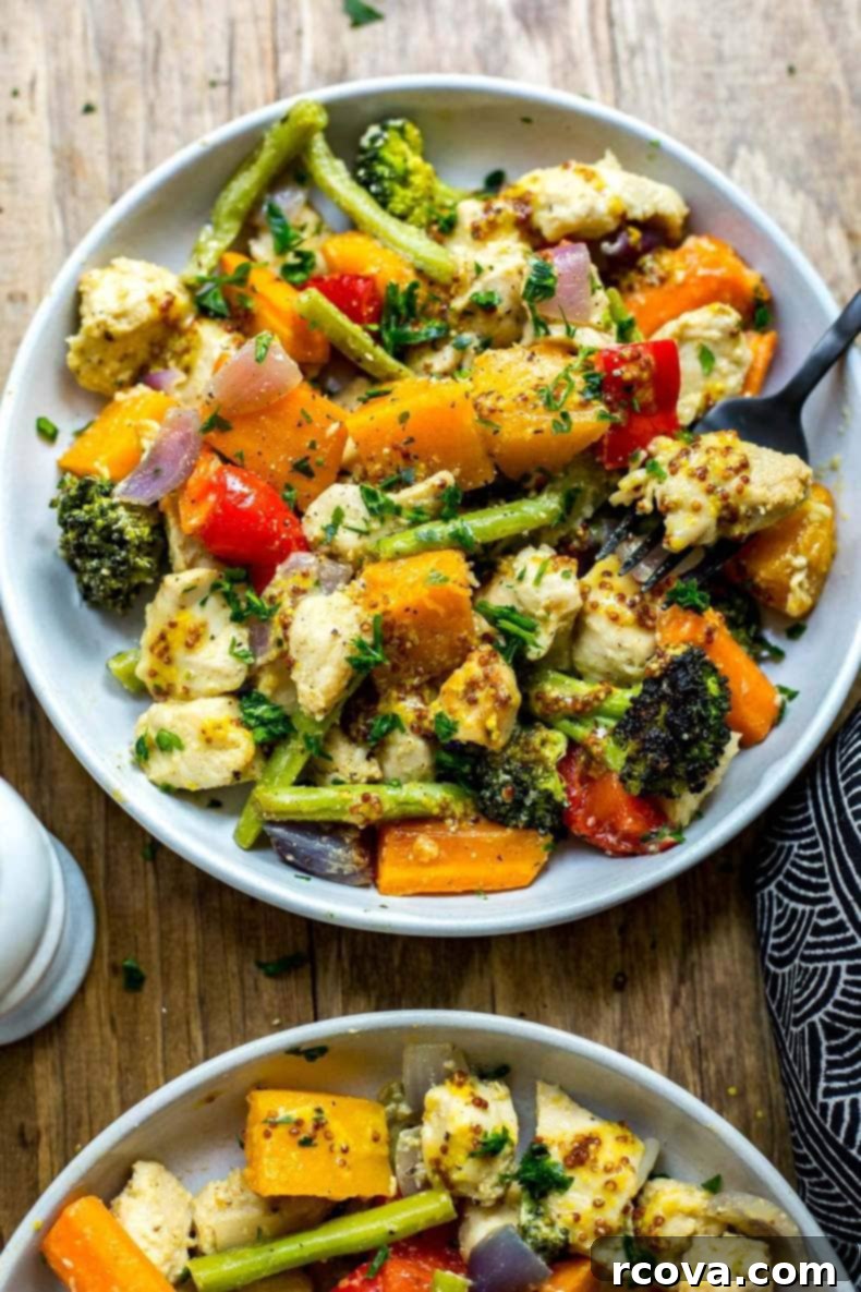 Simple Golden Honey Dijon Sheet Pan Chicken 5 Served Sheet Pan Honey Dijon Chicken on a plate
