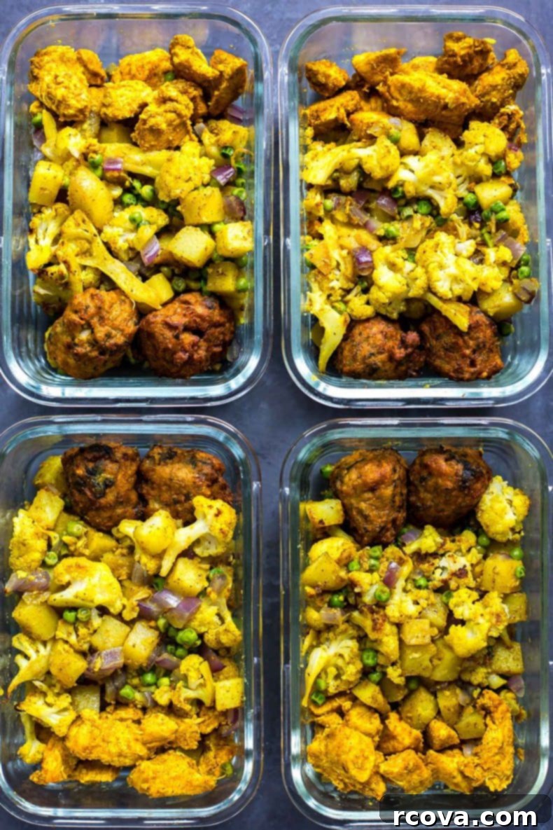 Spice Route Chicken Meal Prep 4 Close-up of Tandoori Chicken and Aloo Gobi Roasted on a Sheet Pan