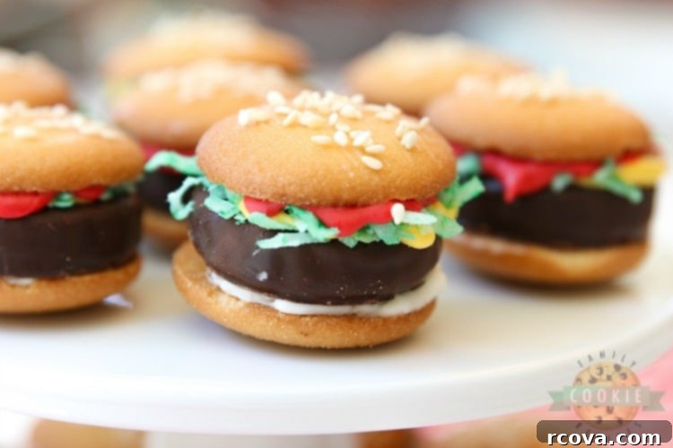 Slider Cookies 3 Cute Nilla Wafer hamburger cookies arranged on a plate, showcasing their adorable burger-like appearance.