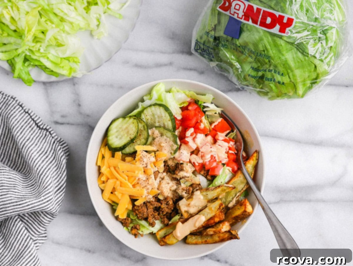 Signature Drizzle Cheesy Burger Bowls 8 Assembled burger bowl with all toppings and sauce
