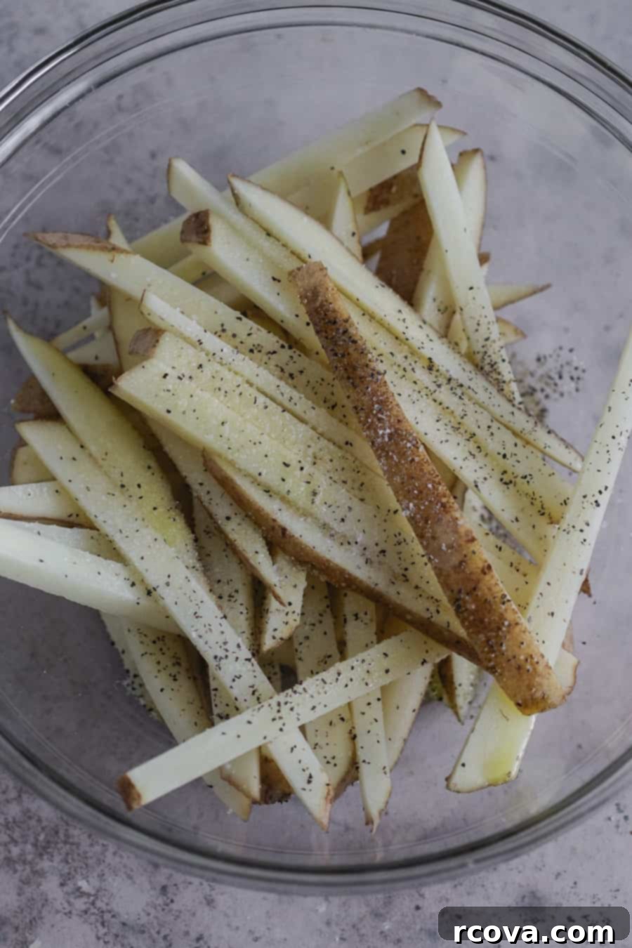 Homemade Air Fryer Fries: Perfectly Crispy 5 Thoroughly drying sliced potatoes before seasoning.