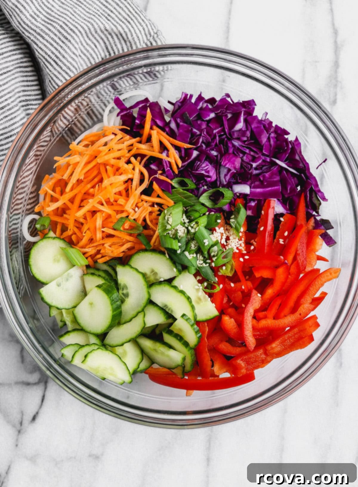 Gluten Free Sesame Rice Noodle Salad 4 bowl of cold sesame noodle salad with chopsticks