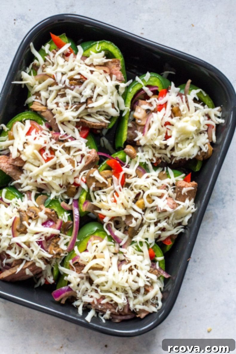 Low Carb Philly Cheesesteak Stuffed Peppers 5 Freshly baked Philly Cheesesteak Stuffed Peppers with melted cheese