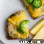 Jalapeño Zing Tuna Melt 6 A top-down view of a spicy tuna melt sandwich, with melted cheddar and a hint of jalapeño.