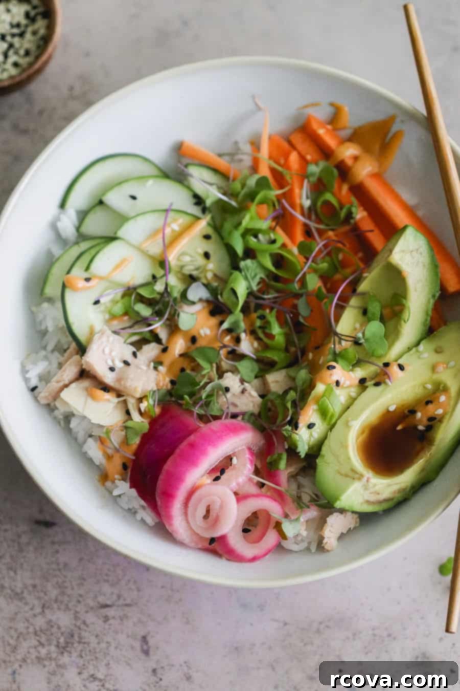 Tangy Sriracha Mayo 5 Tuna Roll Bowl topped generously with creamy Sriracha Mayo.