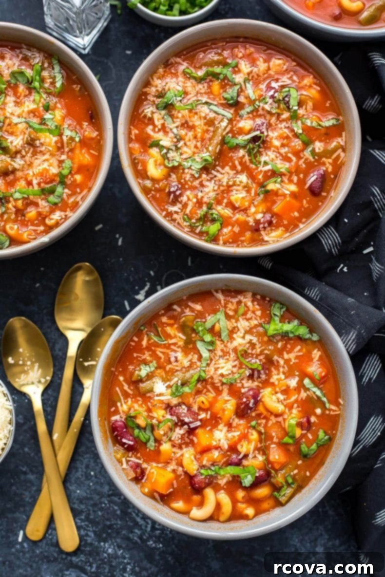 Hearty Instant Pot Minestrone 5 A ladle serving Super Easy Instant Pot Minestrone Soup into a bowl