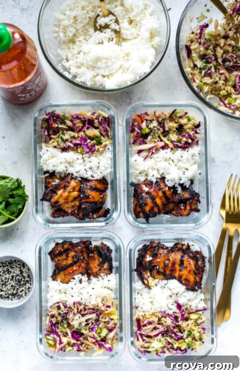 Korean Chicken Power Bowls 2 Vibrant Korean Chicken Meal Prep Bowls with juicy chicken, crunchy sesame slaw, and fluffy jasmine rice, ready for a healthy lunch.