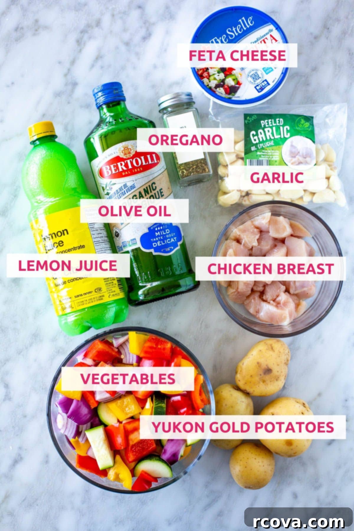 Mediterranean Sheet Pan Chicken: Ready-to-Go Meals 4 Ingredients for making sheet pan Greek chicken: feta cheese, olive oil, lemon juice, garlic, chicken breasts, bell peppers, zucchini, red onion, and Yukon gold potatoes