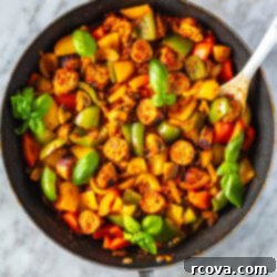 One-Pan Sausage, Peppers and Onions 11 A skillet with sausage, peppers and onions.