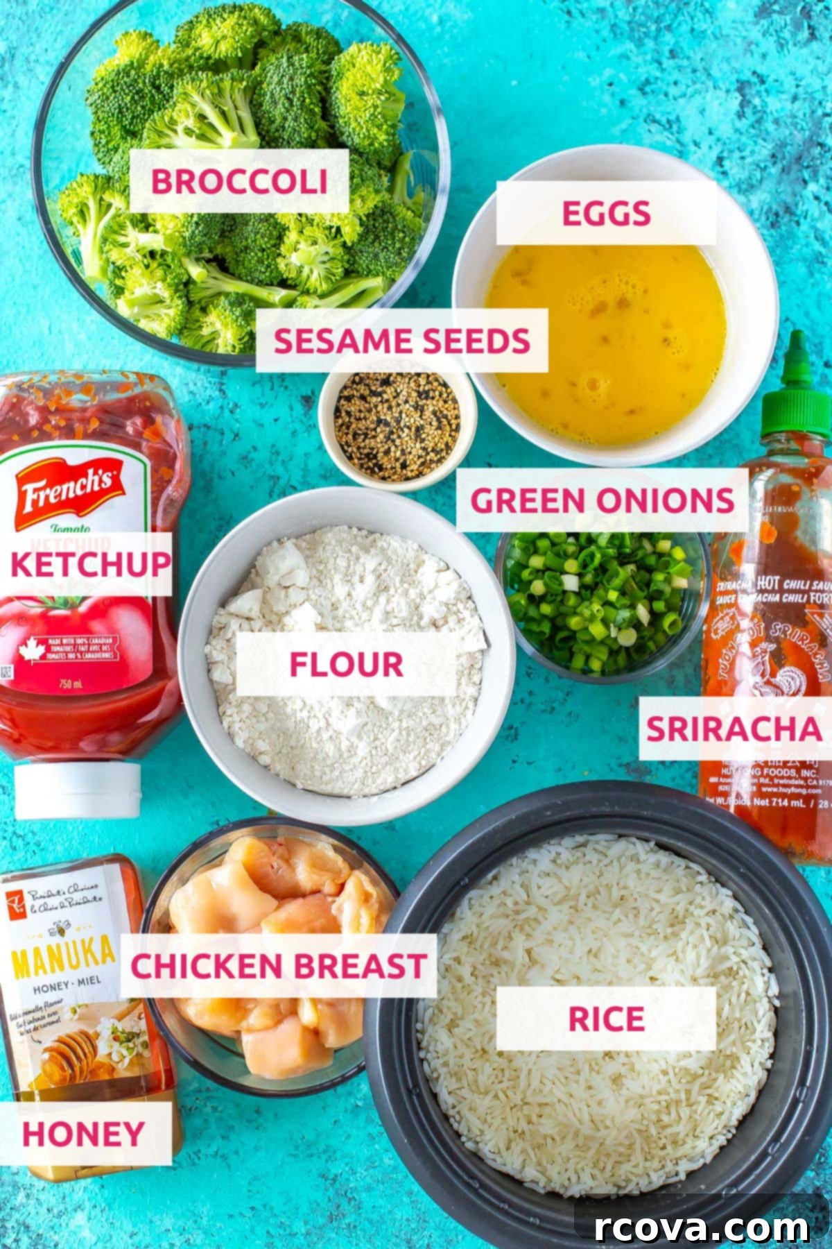 Sweet Heat Honey Sriracha Chicken Bowls 4 Ingredients for honey sriracha chicken meal prep bowls: chicken breast, rice, sriracha, flour, eggs, green onions, sesame seeds, broccoli, ketchup and honey laid out.