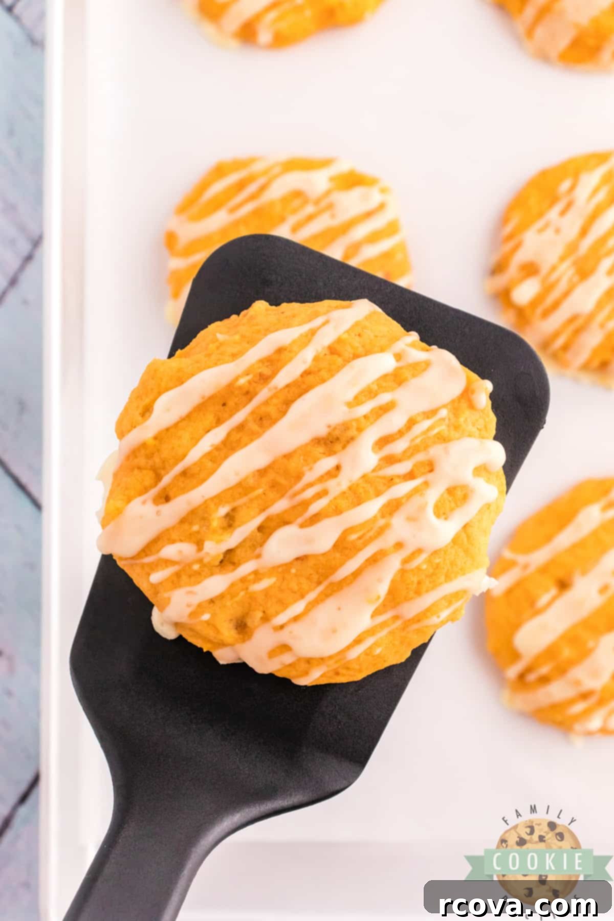 Golden Pumpkin Cookies 16 Plate of orange glazed pumpkin cookies, showcasing their inviting appearance.