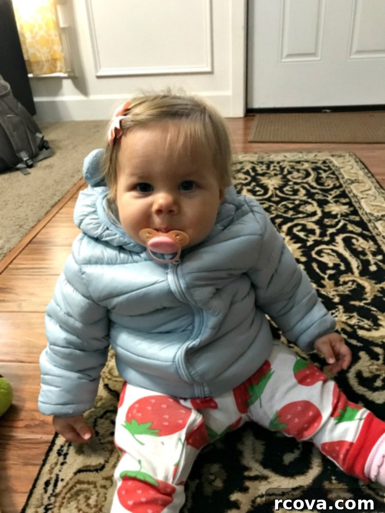 Velvety Vanilla Treats 12 A cute baby bundled up in a puffy winter coat, enjoying the changing weather outdoors.