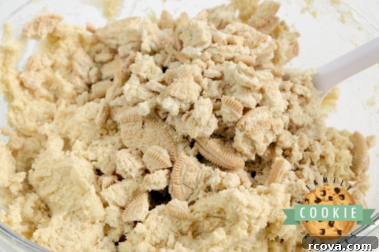 Velvety Vanilla Treats 4 A bowl of creamy cookie dough studded with crushed Golden Oreo cookies.