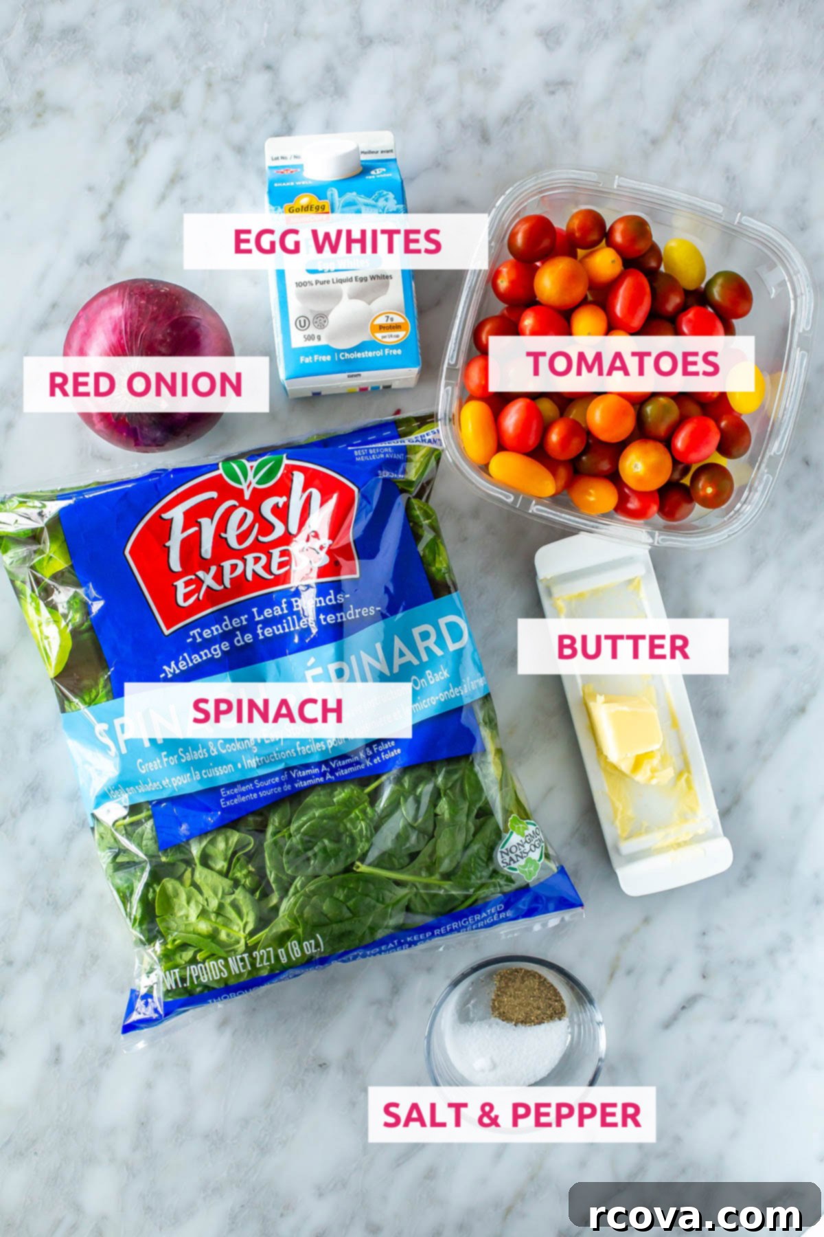 Quick 5-Ingredient Egg White Frittata Meal Prep 4 Ingredients for egg white frittata: egg whites, cherry tomatoes, red onion, spinach, butter, salt and pepper laid out on a table.