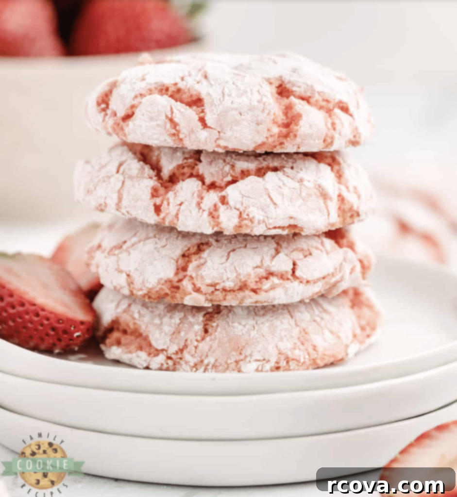Irresistible Strawberry Cookies 2 Strawberry Cool Whip Cookies on a cooling rack