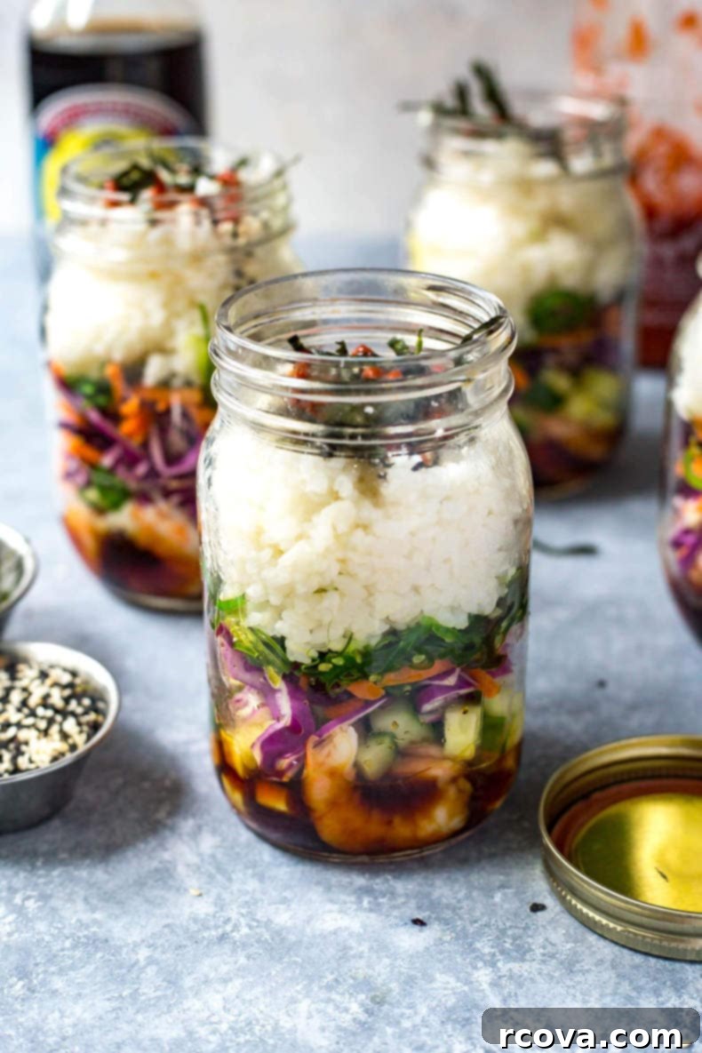 40+ Easy and Healthy Meal Prep Lunches for Work 39 Dynamite Shrimp Sushi Jars for meal prep, with sushi fixings and delicious sauce.