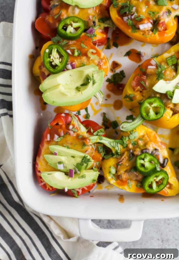 28 Deliciously Healthy Ground Turkey Meals 18 Cheesy Turkey Enchilada Stuffed Peppers via Joyful Healthy Eats