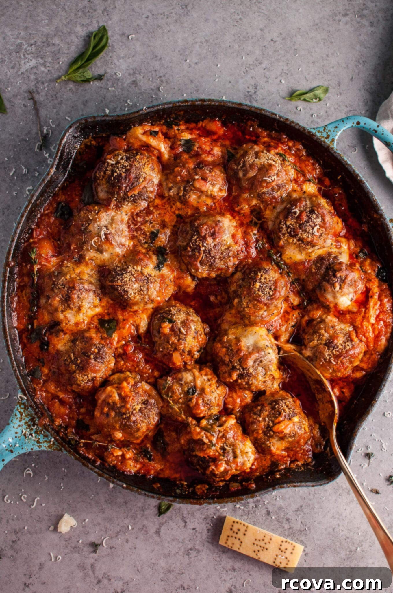 Quick and Wholesome One Pan Meals 7 Cheesy Baked Meatball Skillet via Salt & Lavender
