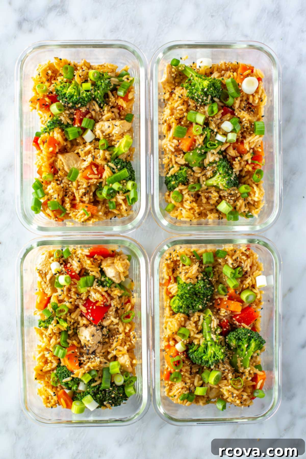 Instant Pot Teriyaki Chicken and Rice 9 Four meal prep containers, each with a serving of Instant Pot teriyaki chicken and rice, ready for healthy meals.