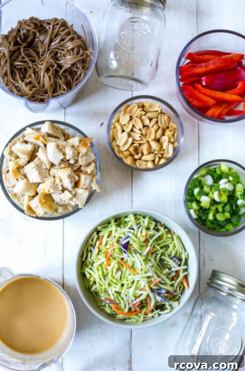 Zesty Thai Chicken Soba Jars 5 First layer of Thai Chicken Soba Noodle Salad Jars with satay sauce and chicken