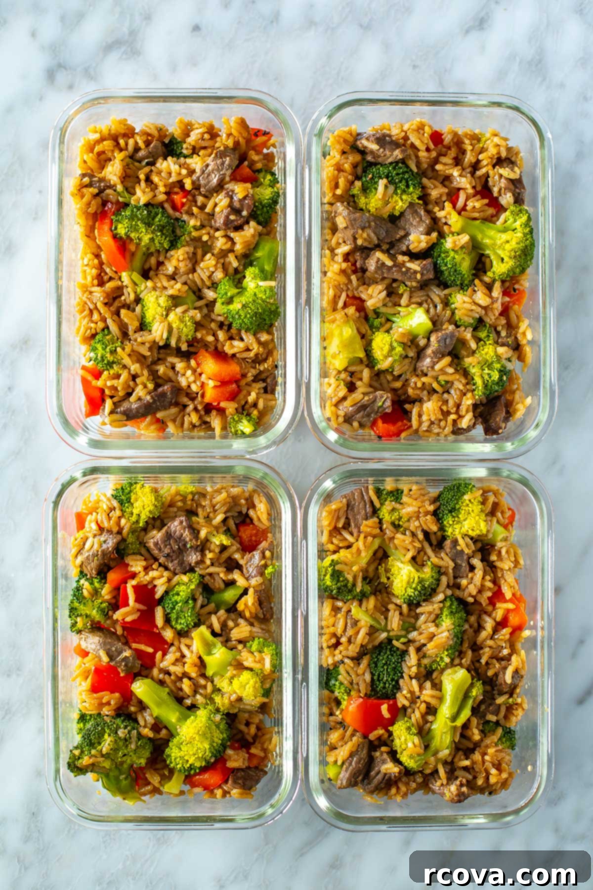 Quick Instant Pot Beef and Broccoli with Rice 9 Four meal prep containers, each with a serving of Instant Pot beef and broccoli.