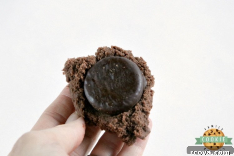 Mint Chocolate Delights 4 Placing a York peppermint patty in the middle of the cookie dough