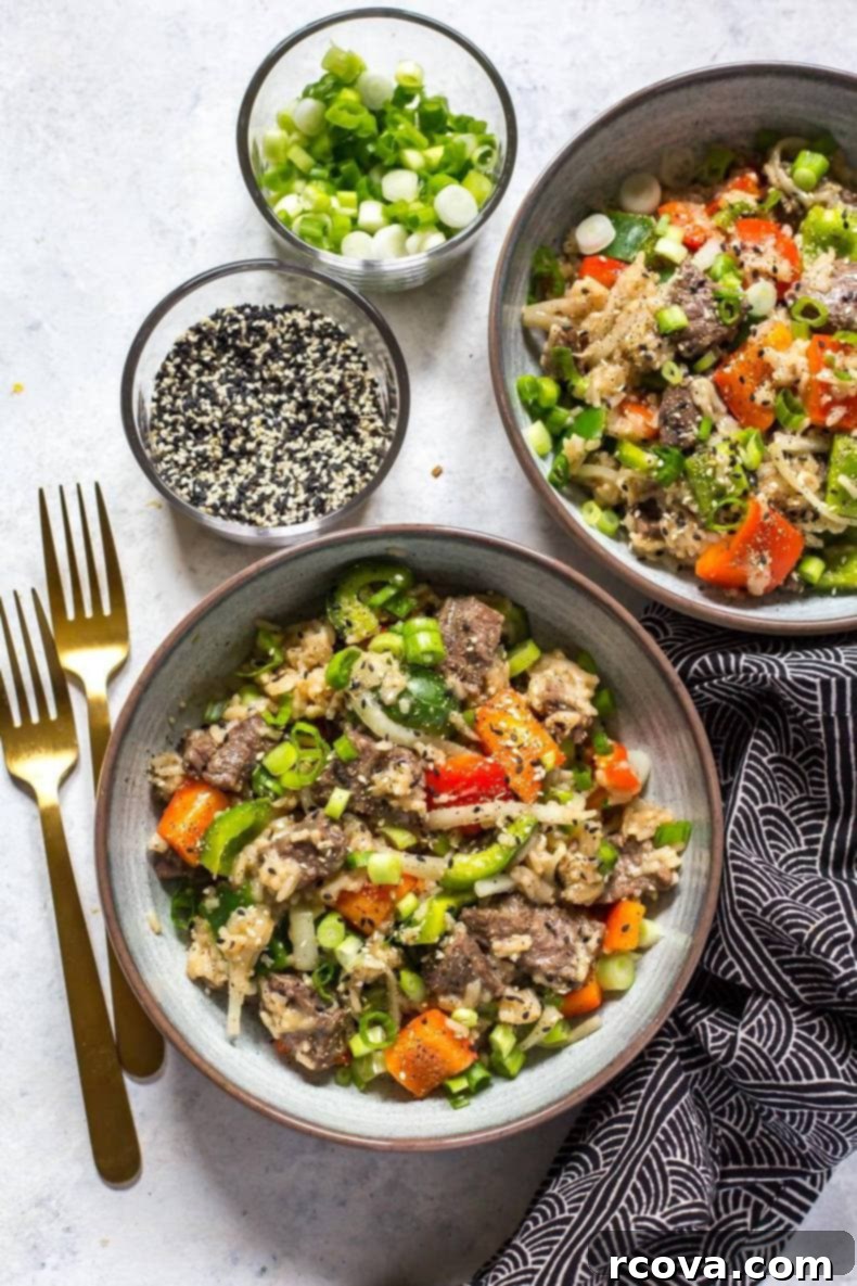Quick and Tender Instant Pot Pepper Steak 7 Overhead shot of Instant Pot Pepper Steak in a serving bowl with chopsticks