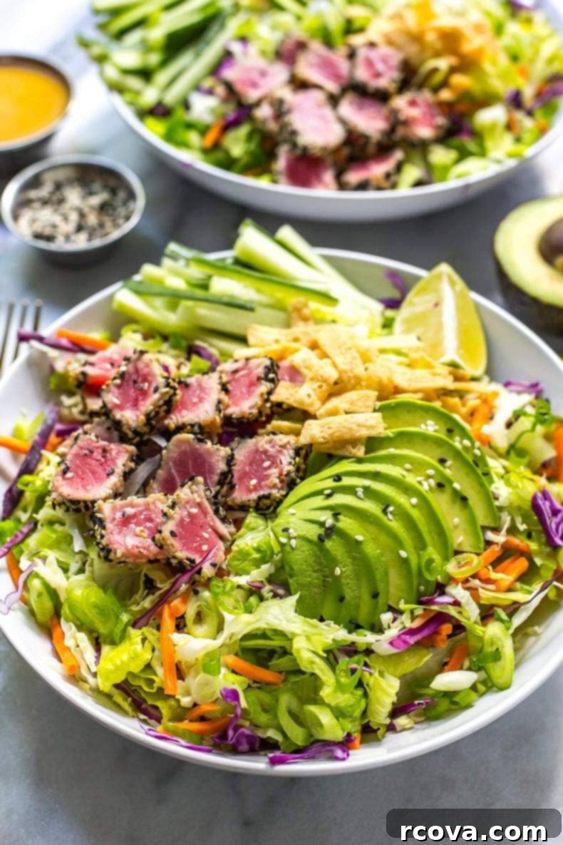 30+ Flavor-Packed Meal Prep Salads You'll Crave 12 Sashimi Tuna Salad with Carrot Ginger Dressing, featuring fresh fish and vibrant vegetables.