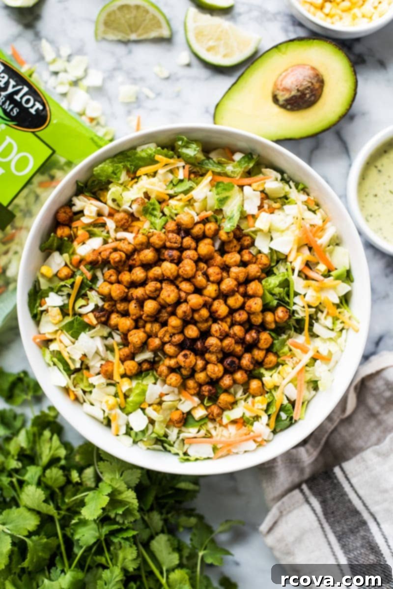 30+ Flavor-Packed Meal Prep Salads You'll Crave 17 Avocado Ranch Chopped Salad via Isabel Eats, topped with crispy chickpeas.