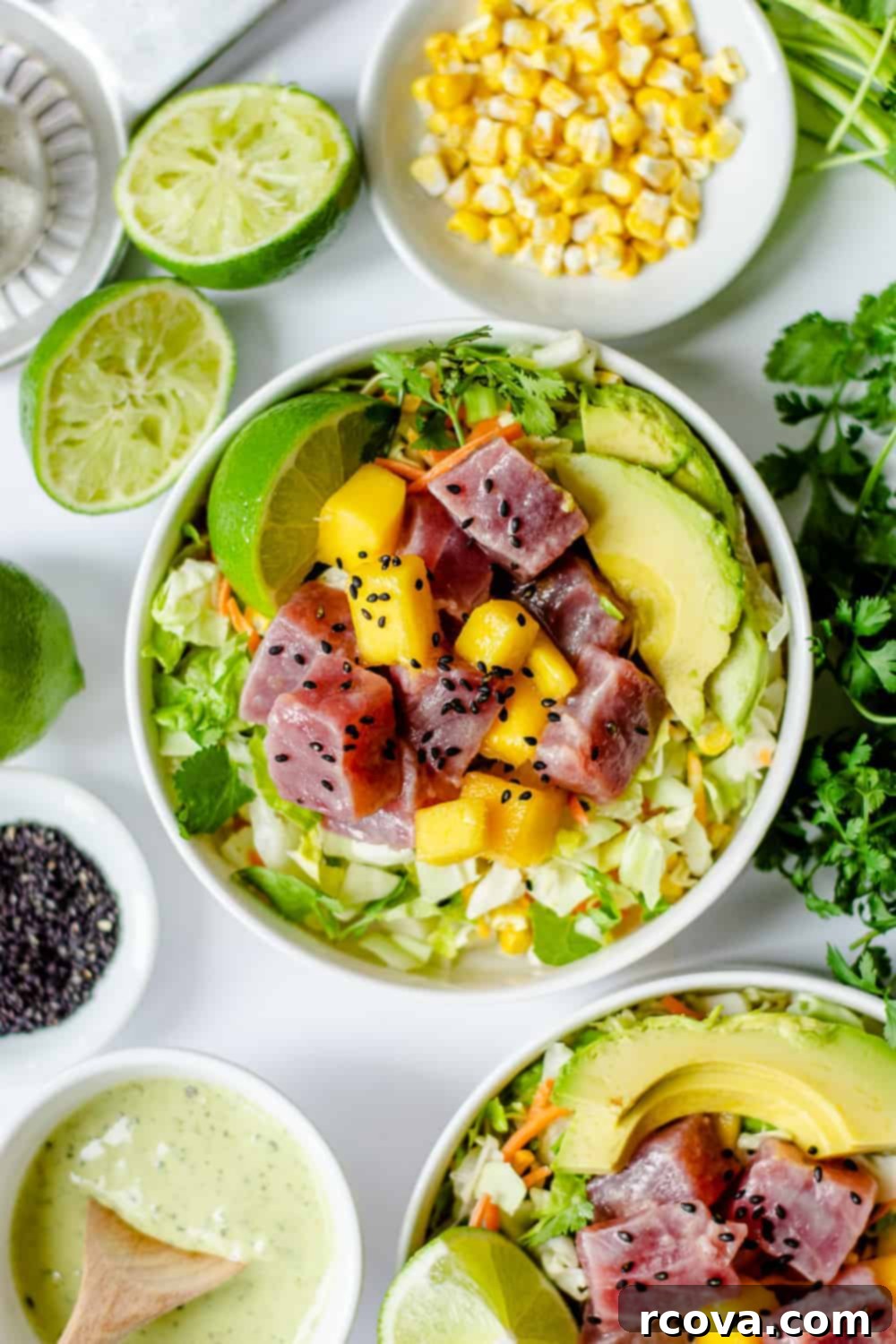 30+ Flavor-Packed Meal Prep Salads You'll Crave 19 Avocado Ranch Ahi Tuna Poke Bowl with Mango (Gluten Free) via The Butter Half, a flavorful and healthy dish.