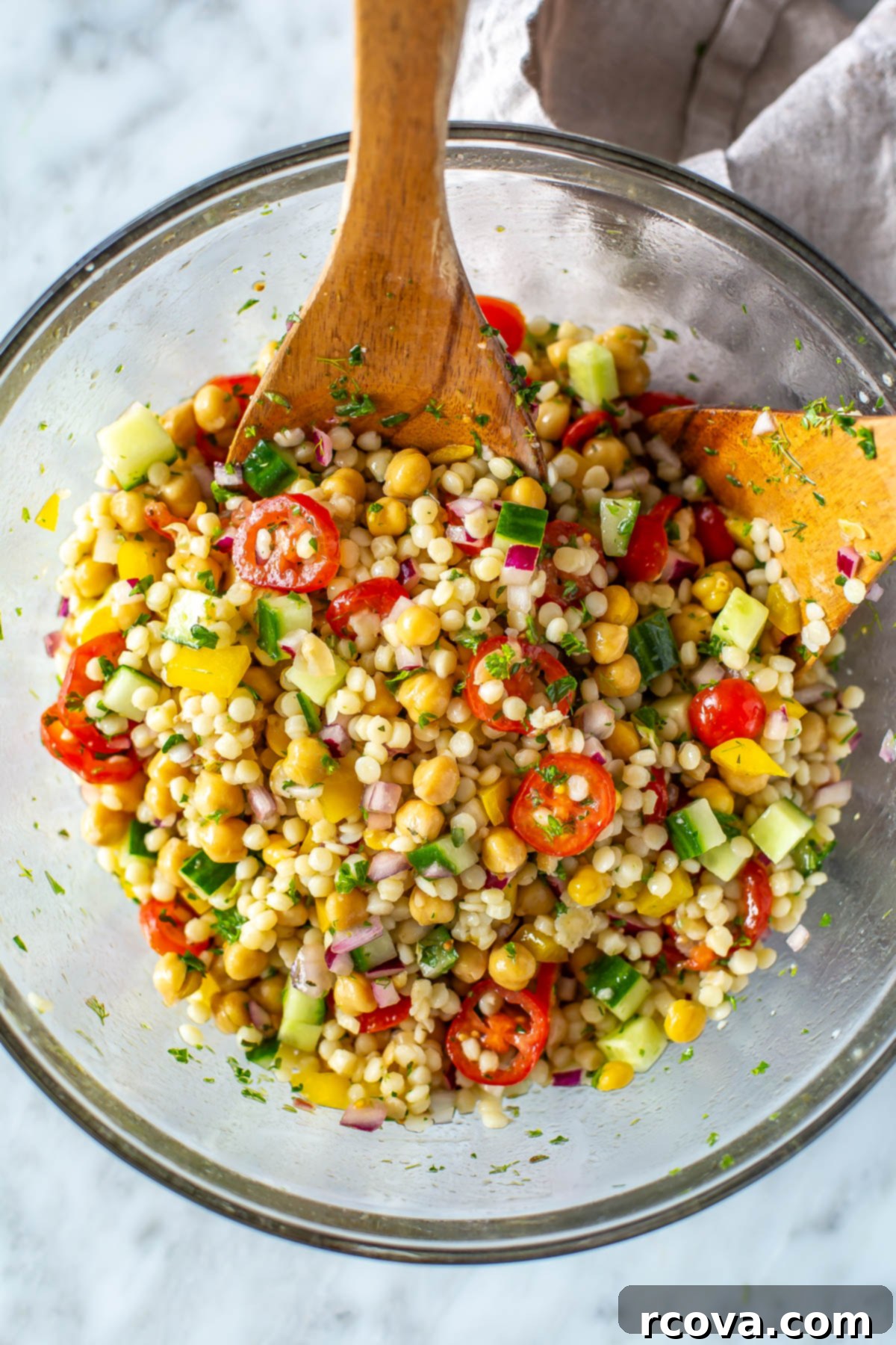 30+ Flavor-Packed Meal Prep Salads You'll Crave 25 An overhead shot of Mediterranean couscous salad, filled with fresh veggies and herbs.