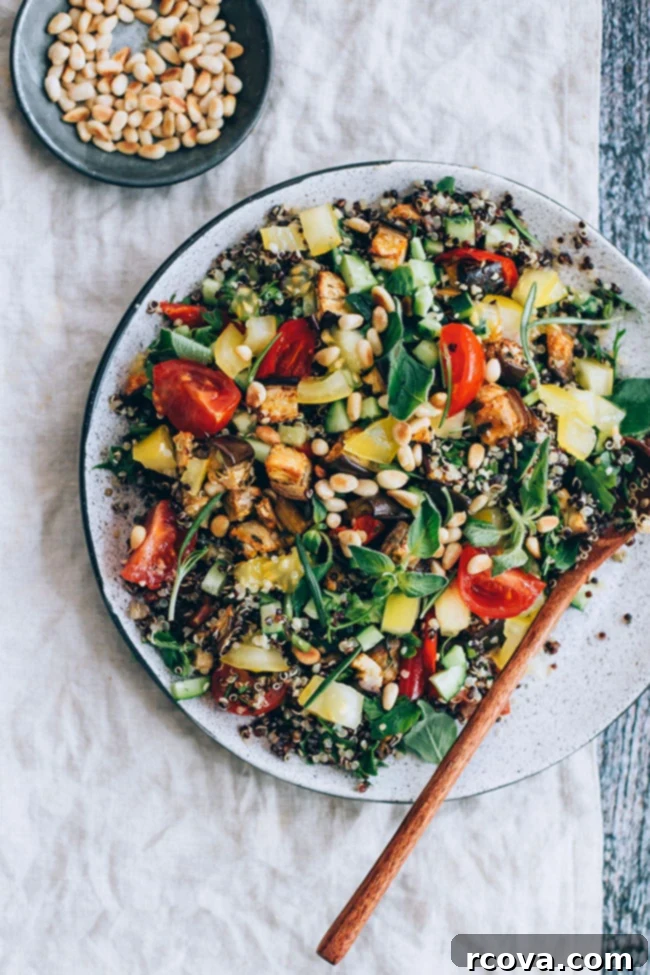 30+ Flavor-Packed Meal Prep Salads You'll Crave 28 A big plate of Mediterranean quinoa salad with roasted vegetables, with a small bowl of pine nuts off to the side.