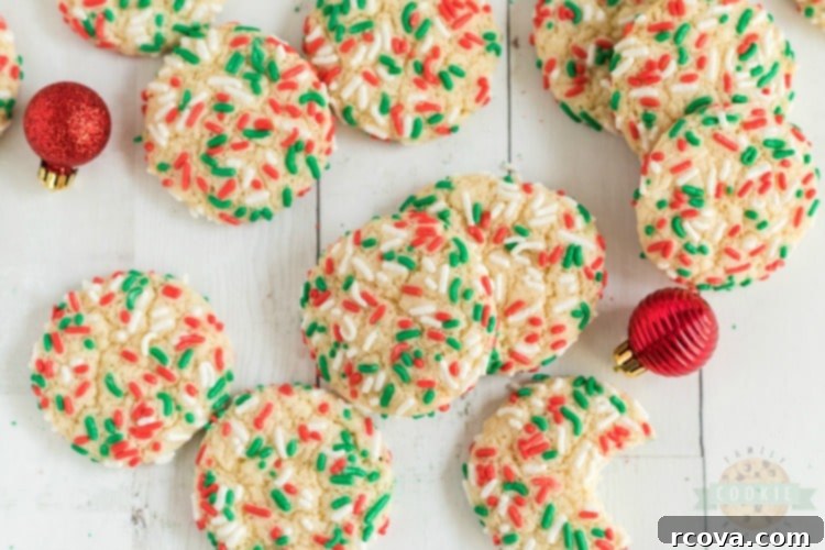 Festive Sprinkle Cookies 2 Christmas Sprinkle Cookies are sugar Cookies rolled in Christmas sprinkles for a special holiday treat! Delightfully soft & chewy Christmas cookies made with festive holiday sprinkles!