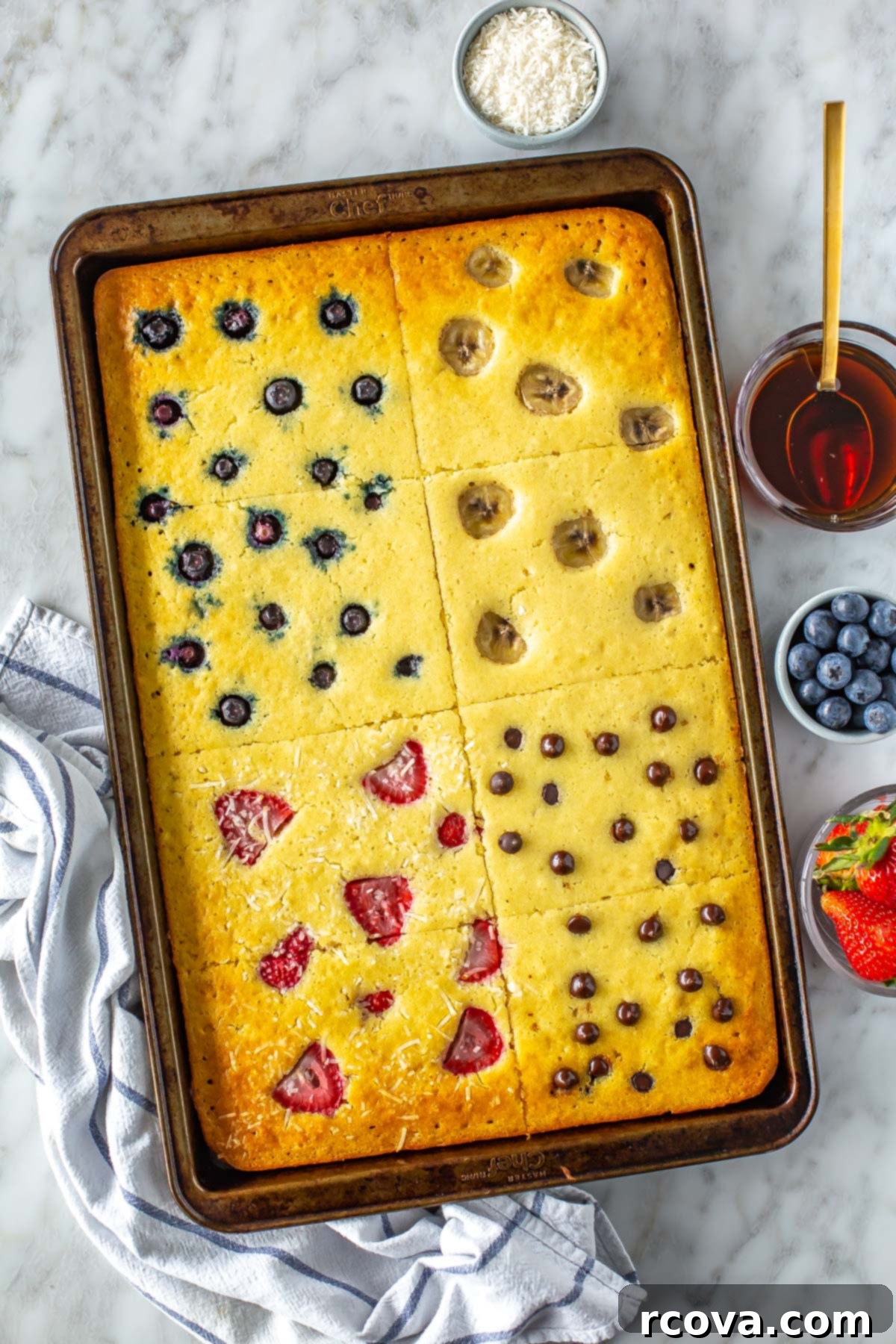 Fuel Your Mornings: Healthy Breakfast Prep 13 Sheet pan pancakes with various toppings baked in them.