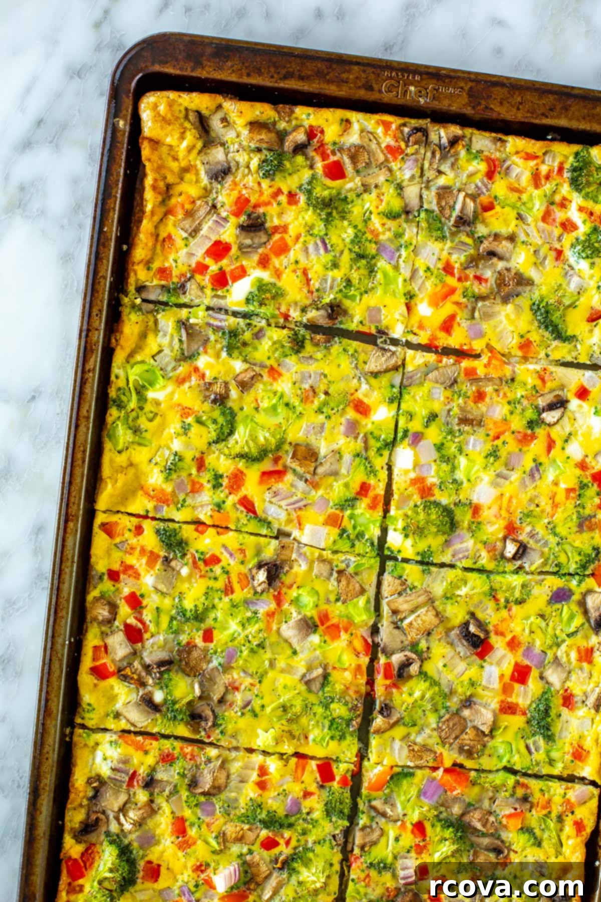 Fuel Your Mornings: Healthy Breakfast Prep 37 Sheet pan eggs loaded with veggies.